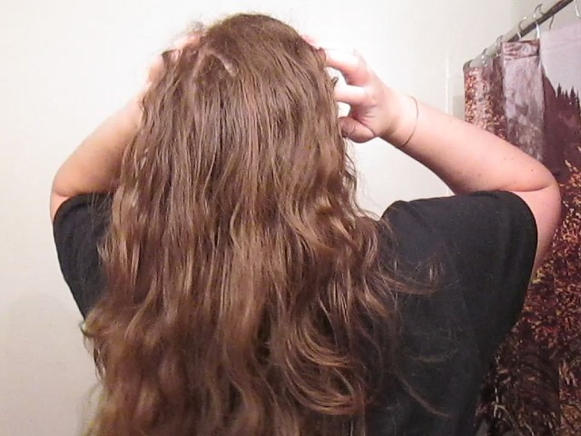 Removing a Side Bun With Long Curly Hair 