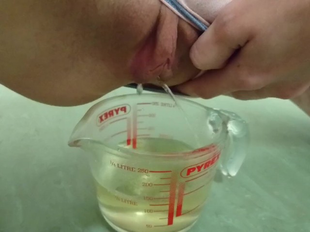 Pee in Measuring Cup | Close Up 
