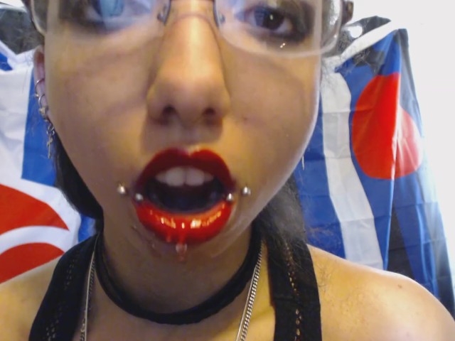Bright Red Lipstick Drooling a Lot of Saliva and Spit 