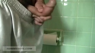 Watch Tommy Stroke His Monster Cock in The Bathroom