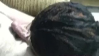 Ebony swinger Honey swallows a stiff white cock