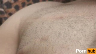 Solo bald guy masturbates on couch