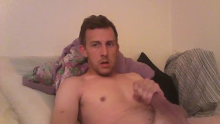 Young Fit Guy plays with his dick.