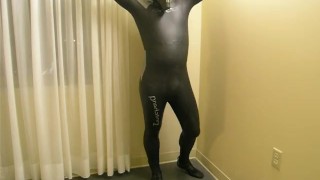 Completing the transformation as I change into orca predator wetsuit