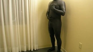 Completing the transformation as I change into orca predator wetsuit