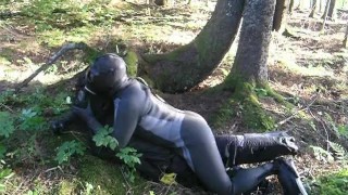 In a fantasy scene a frogman humps a dummy villain in the forest