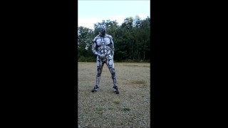 Spandex android jerking off inside spandex outdoors