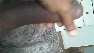 STROKING MY BIG FAT LONG BLACK COCK..