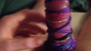 Tied up with 6 cock rings on cumshot!