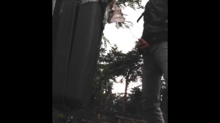 Pissing in Public against a Dustbin