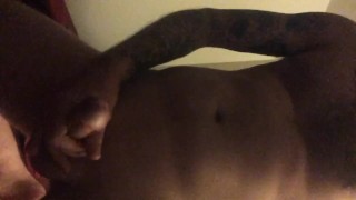 Masturbating