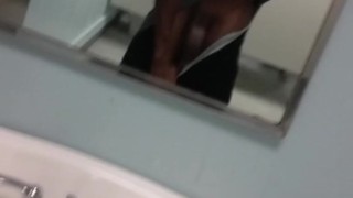 At work playing with my big black dick