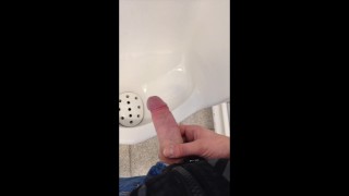 boy jerking and cumming in urinal