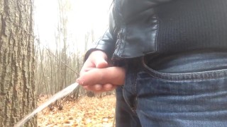 Taking a huge piss against the three in public
