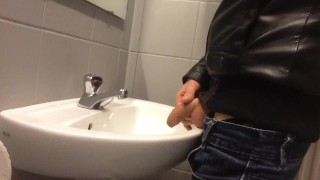 Dirty boy Pissing in public sink