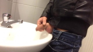Dirty boy Pissing in public sink