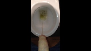 Boy taking a piss