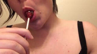 Masturbating while sucking on a sucker