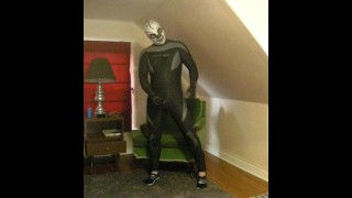 wetsuited lucha libre skeleton masked frogman playing with his cock