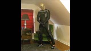 wetsuited lucha libre with skeleton and pantyhose stocking mask