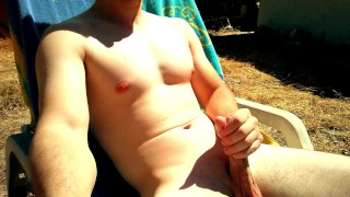 Russian tanning and masterbating flexed long cock