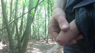 taking a piss in the woods