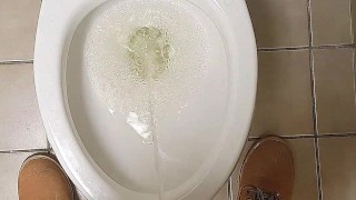 Man peeing standing up...Pov