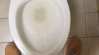 Man peeing standing up...Pov