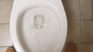 Man peeing standing up...Pov