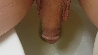 Man peeing sitting down...Pov