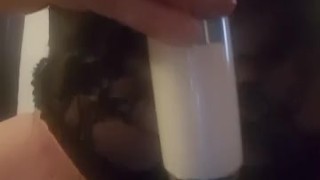 Rubbing my clit with my wand while riding my dildo.