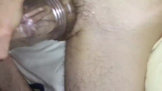 Young twink stroking his big cock and fucking a fleshlight