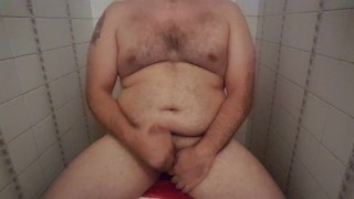 Bear jacking off in the toilets