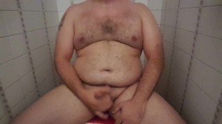 Bear jacking off in the toilets