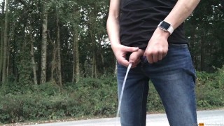 Single boy is pissing in public hoping to caught by a piss lover