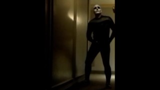 skeleton faced frogman in hotel