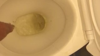 Me peeing into toilet