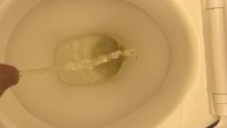 Me peeing into toilet