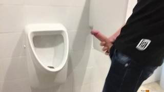 Dutch boy play with his cock in the men's room until he almost get caught