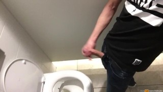 Dutch boy play with his cock in the men's room until he almost get caught