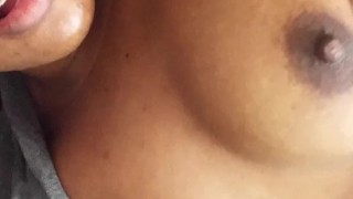 Massaging big natural ebony tits