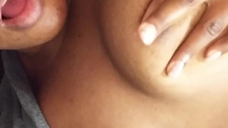 Massaging big natural ebony tits