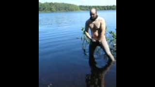 jerking off in lake wearing spandex tights, latex gloves and stocking mask