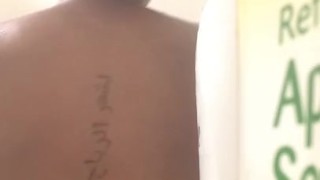 Naked yoga ebony hanging from shower