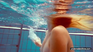 Cute Melissa plays underwater