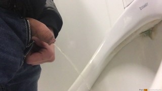 A quick pee in the urinal