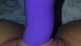 Playing with toy and pussy
