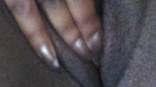 Wet ebony pussy rubbing while watching porn
