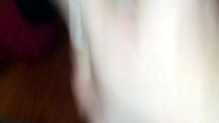 Masturbating