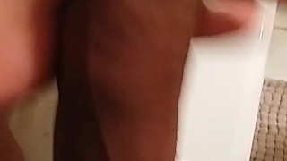 Stroking thick uncut cock